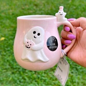 cobwebs and cauldrons pink ghost mug